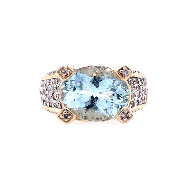 14K Yellow Gold Estate Ring Featuring Center 3.20CT  Oval Aquamarine And 1.16CT Of Round Diamonds Along Shank And Head
