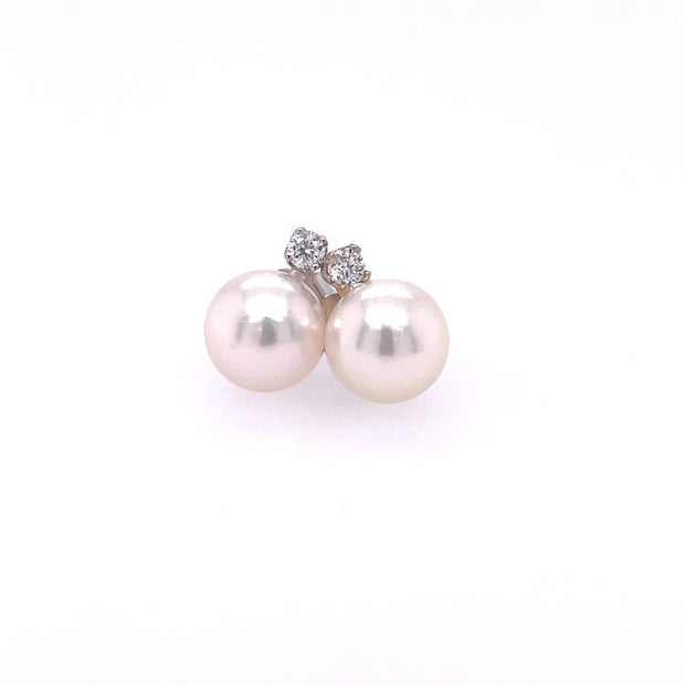 14K White Gold Stud Earrings Featuring 6.0-6.5MM Round Akoya Pearls And Two Diamonds At .04CT Total Weight