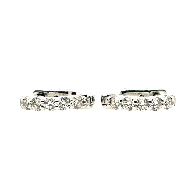 14K White Gold Huggie Hoop Earrings Featuring .50CT Total Weight Of Round Diamonds