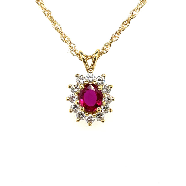 14K Yellow Gold Estate Necklace Featuring Center Oval Ruby And Halo Of Round Diamonds