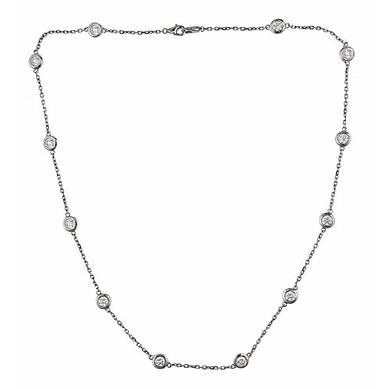 Lady's 14 Karat White Gold 18" Diamonds By The Yard Necklace  With 12=0.73Tw Round G/H Si1- Si2 Diamonds